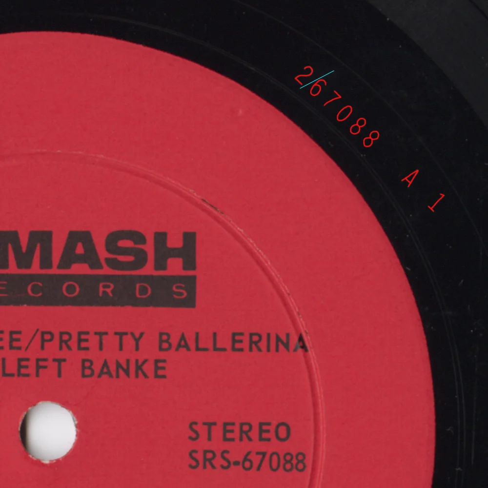 The runout area and part of the label on side A of my copy of Smash SRS-67088 (The Left Banke). The stamping is 2/67088 A 1. I traced the stamping in red and the handwritten slanted line in light blue
